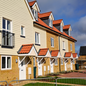 Landlord exploring guaranteed rent scheme benefits in the UK for consistent income.