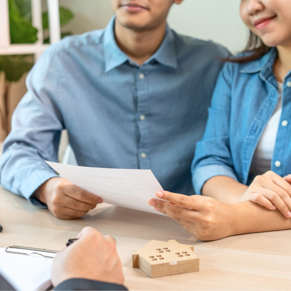 Landlord signing up for a guaranteed rent scheme with letting agents.