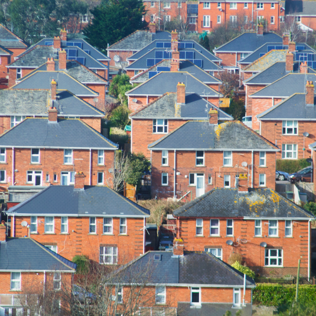 Landlord discussing guaranteed rent schemes with a property manager.