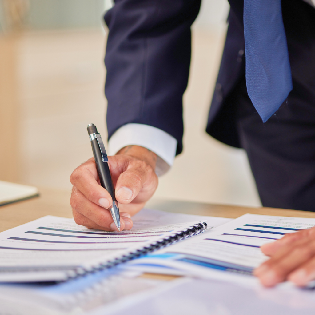 Landlord reviewing tenancy agreements with a legal expert for protection